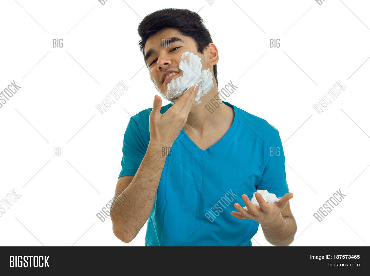 guy with black hair tilted head and deals on face shaving foam