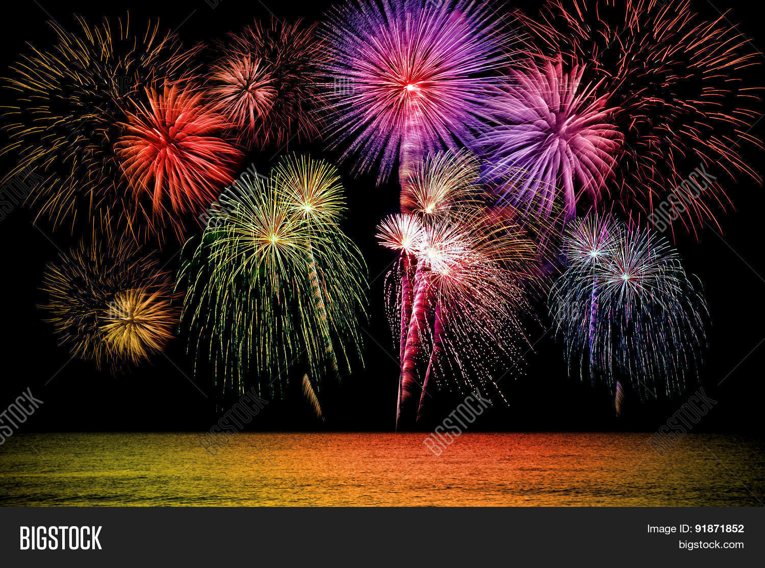 firework celebration on the dark sea background.