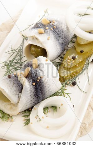 pickled herring with gherkin and onion