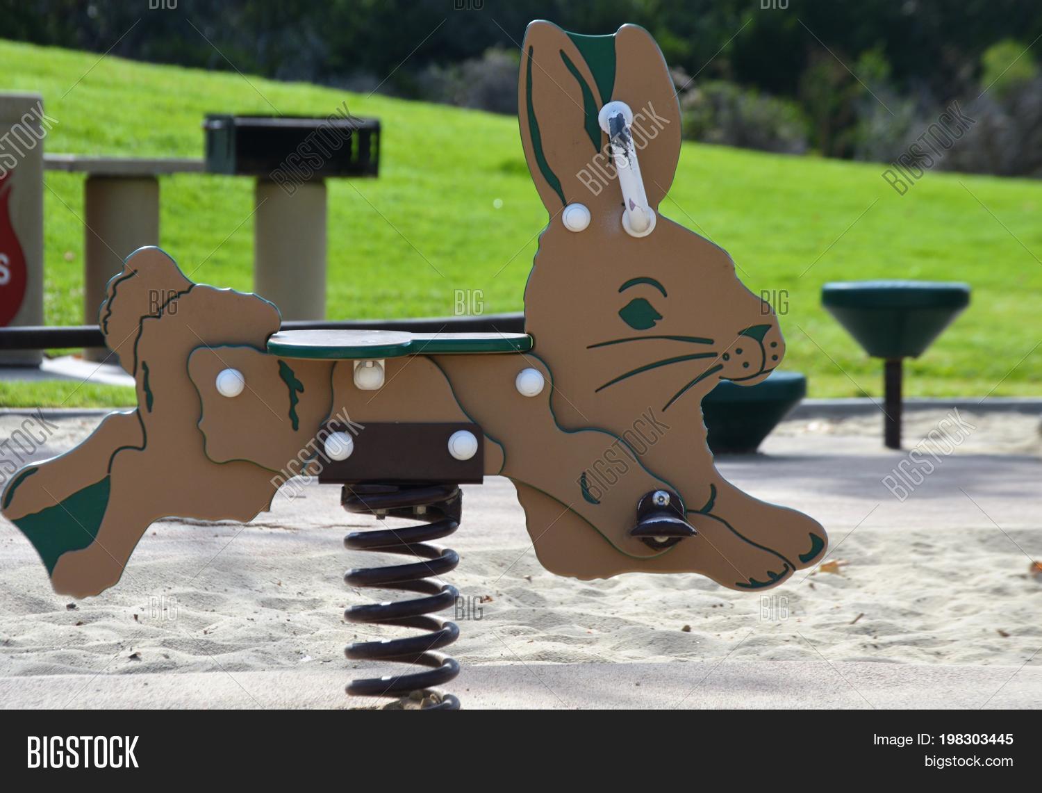 horizontal image of rabbit sit on playgoer toy