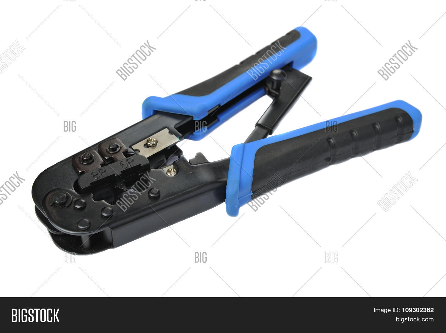 crimping tool on white background, closeup, shallow dof