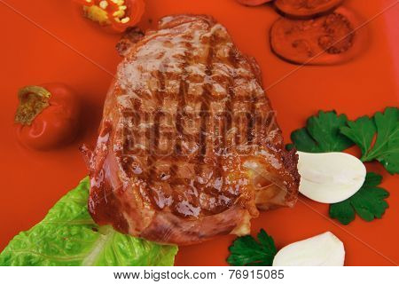 barbecued meat : beef ( lamb ) garnished with green lettuce and